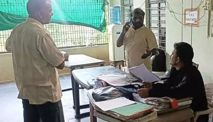 Karepalli tahsildar’s driver accused of acting as broker and collecting cash from applicants.