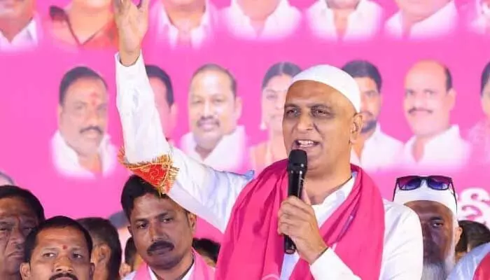 PCC members complain Harish Rao violated election rules by sending bulk messages to voters ahead of polls.