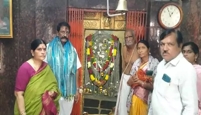 Y. Bal Nagireddy and family received blessings from Vedic priests during temple visit.